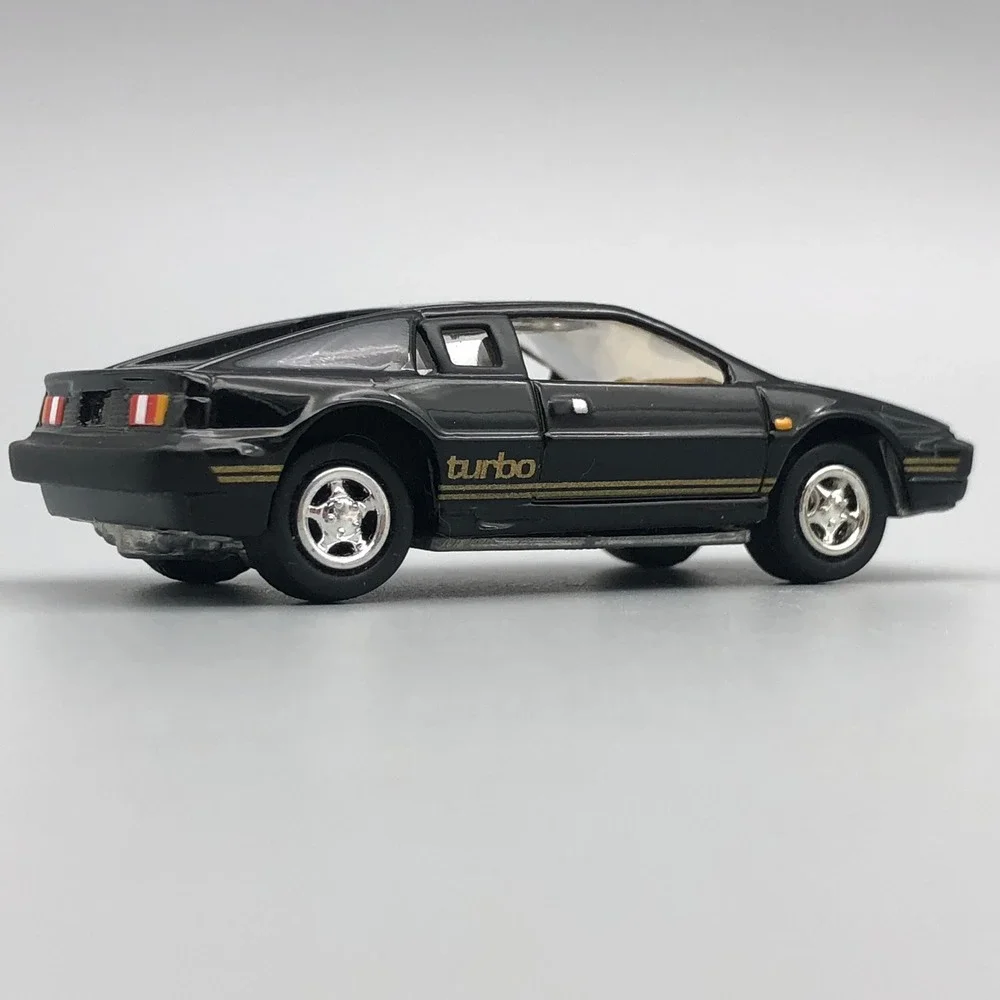 Johnny Lightning 1977 Lotus Esprit Turbo S1 Diecast Car Black Diecast 1/64 Scale
